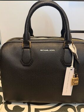 Michael Michael Kors

STUDIO MERCER MEDIUM DUFFLE